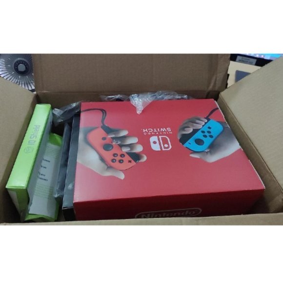 Nintendo Switch™ with Neon Blue and Neon Red Joy‑Con™ - Picture 7 of 7